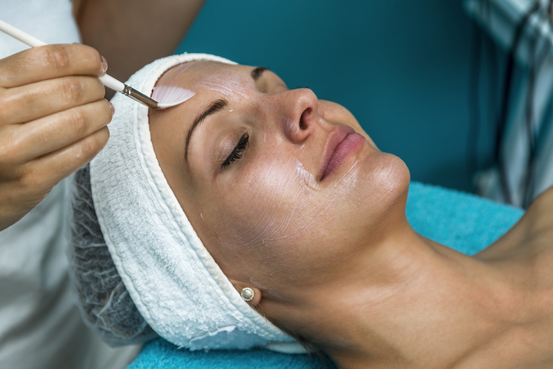 Beautician face cleaning.