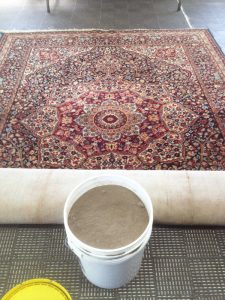 Rug Cleaned of 30 Pounds of Dirt and Dust
