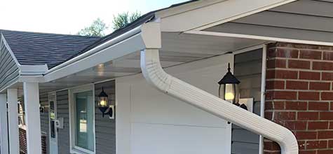 Gutter Guard Systems gutters on a single-story home