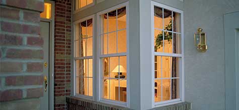 Vinyl Replacement Windows vinyl replacement windows from the outside on a porch