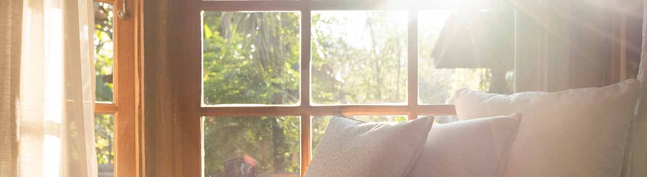 sun beaming through a window, inside view